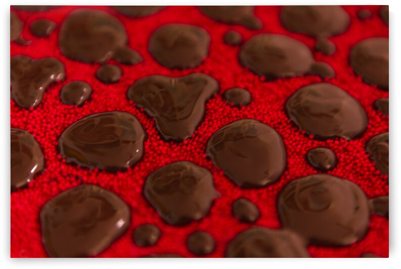 Chocolate Drops on Deep Red Nonpareils by Iris H Richardson