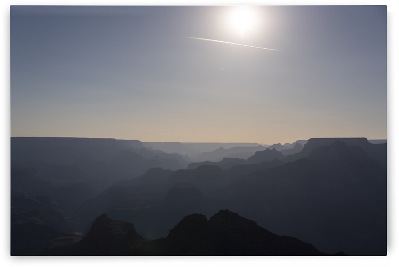 Grand Canyon in the Distance at Sunset by Jean Dzhermakyan