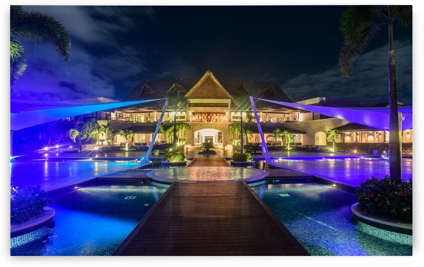 Resort pools at night by Justin Richard Batten