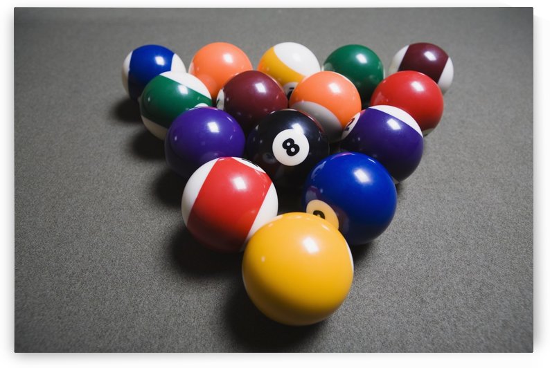 Pool Balls On A Billiard Table With The Eight Ball Facing Upwards by PacificStock