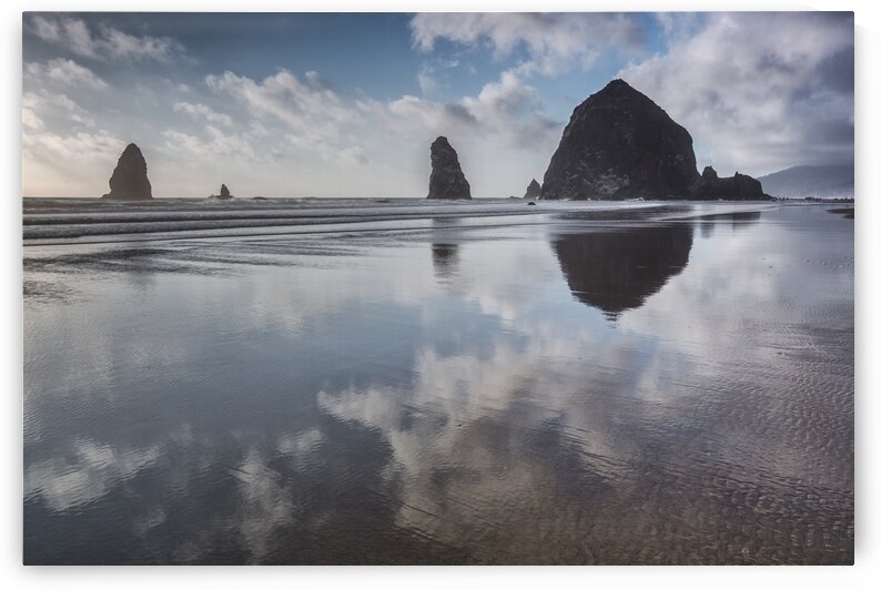 Clouds Reflecting by Images By Jon Evan