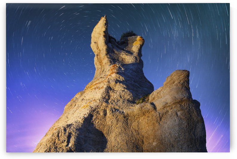 Light painting on La Montagnaise and star trails, Ile Nue de Mingan, Mingan Archipelago National Park Reserve of Canada, Cote-Nord, Duplessis region; Quebec, Canada by PacificStock
