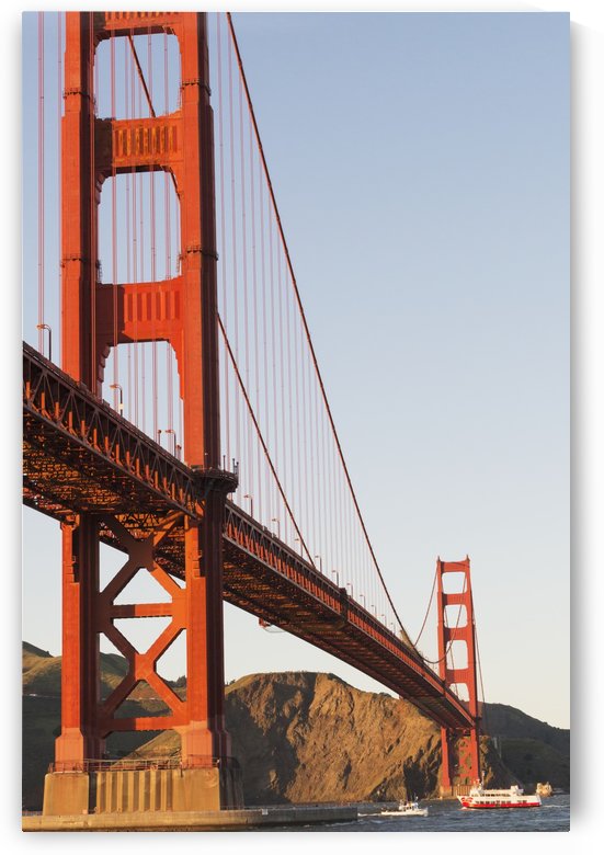 Tour boats cross under Golden Gate Bridge, viewed from Fort Point at the entrance to San Francisco Bay, Marin Headlands visible in background; San Francisco, California, United States of America by PacificStock
