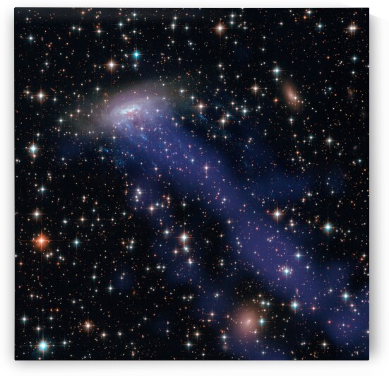Galaxy ESO 137 001 Visible and X ray by NASA Images