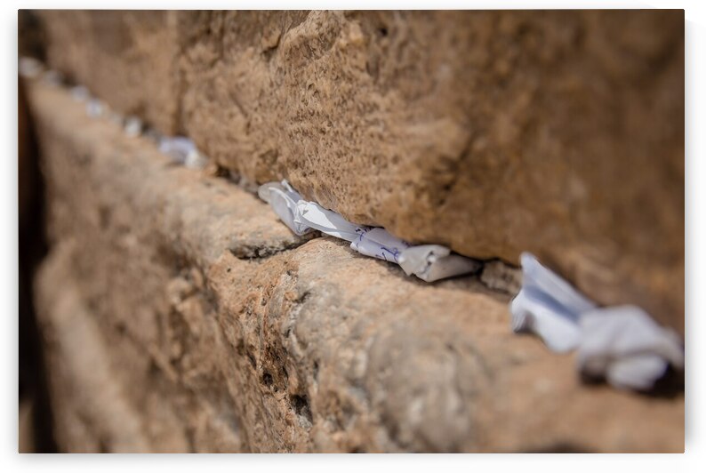 Notes to God in the cracks between the bricks of the Western Wal by Maor Winetrob