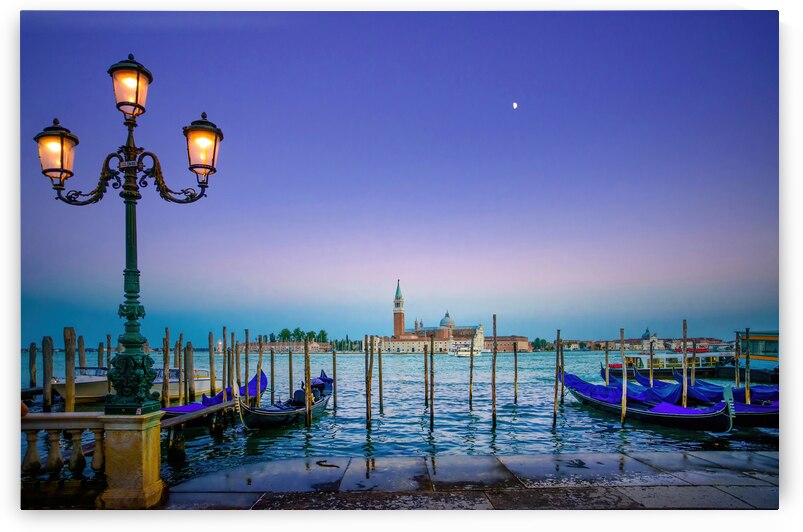 Venice street lamp and gondolas at sunset by Stefano Orazzini