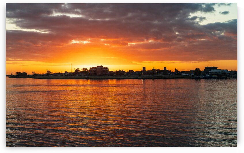 Sunrise over the Mississippi River from French Quarter of New Or by Steve Heap