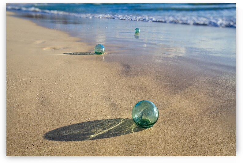 Glass Floats on Golden Sand Hawaii by Lauren Pritchett Photography
