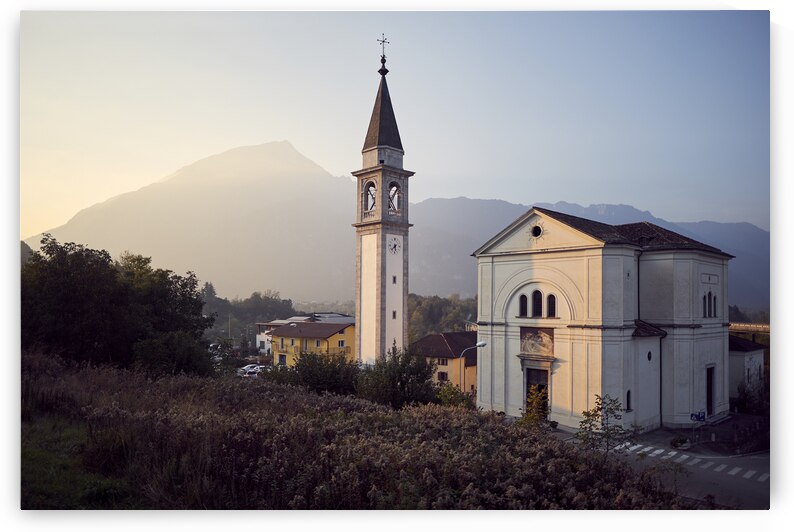 Church in northern italian village during sunset by Atelier Knox