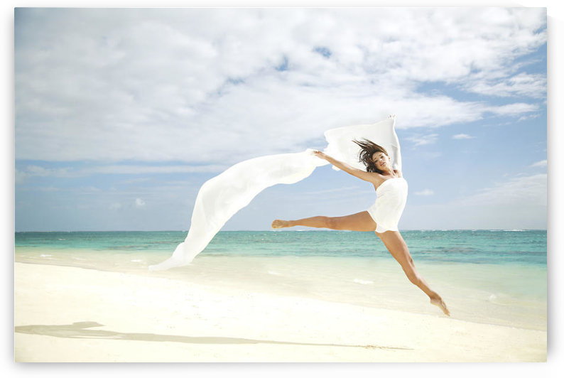 Hawaii, Oahu, Lanikai Beach, Beautiful Female Ballet Dancer Leaping Into Air On Beach With White Flowing Fabric. by PacificStock