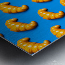 Plastic croissant pattern symbolizes junk food culture critique Metal print