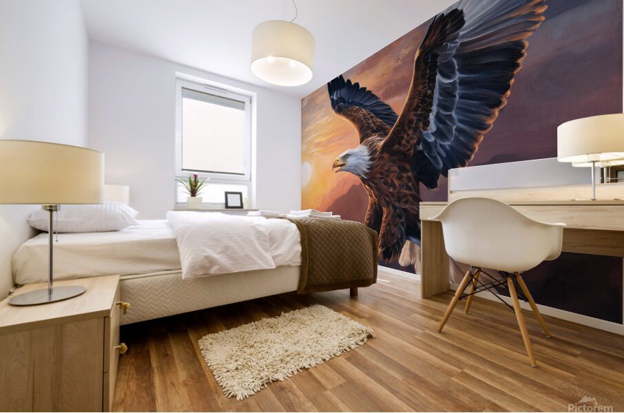 An eagle appears soaring against the backdrop of a stunning sunrise with its majestic wings Mural print