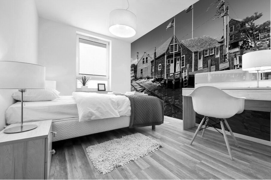 Black and white shot of historic harbour buildings and boat ramp on Cape Cod in New England  Mural print