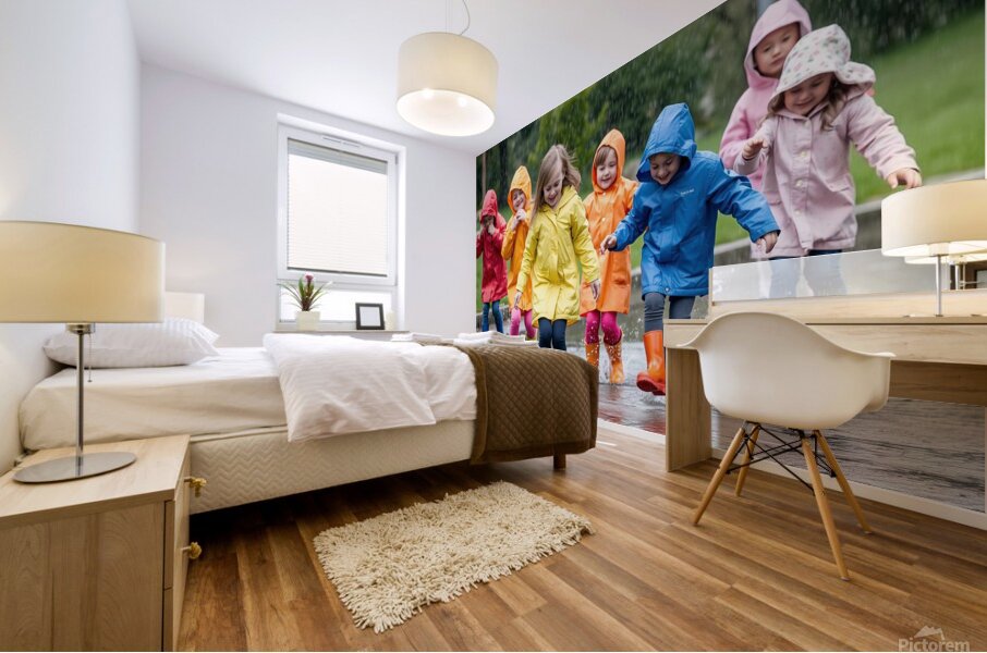 A Group of Children Playing in the Rain Jumping in Puddles Mural print