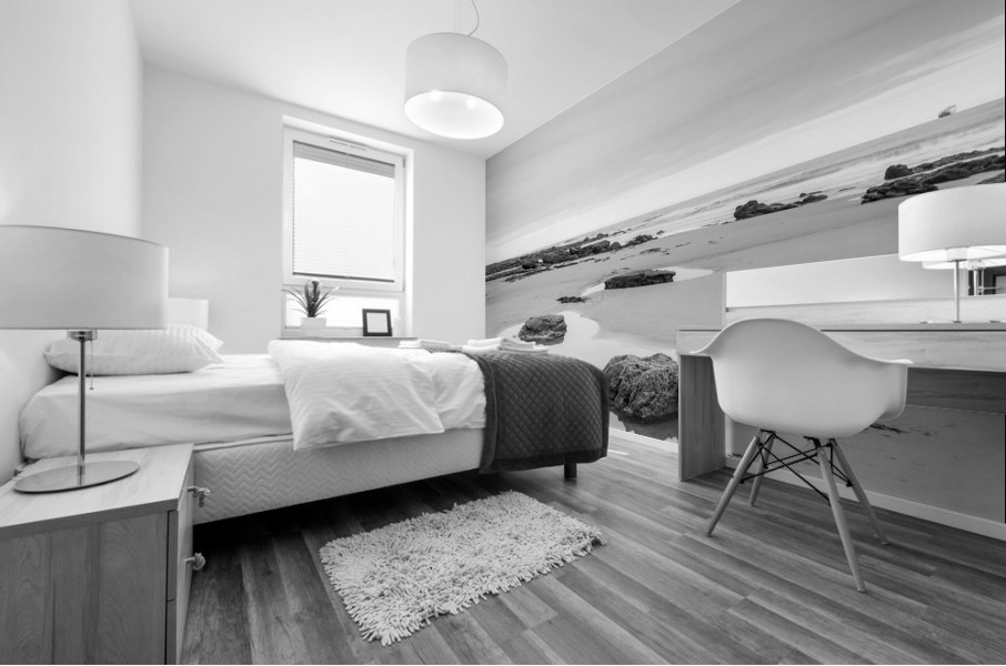 Rock pools on a sandy beach Mural print