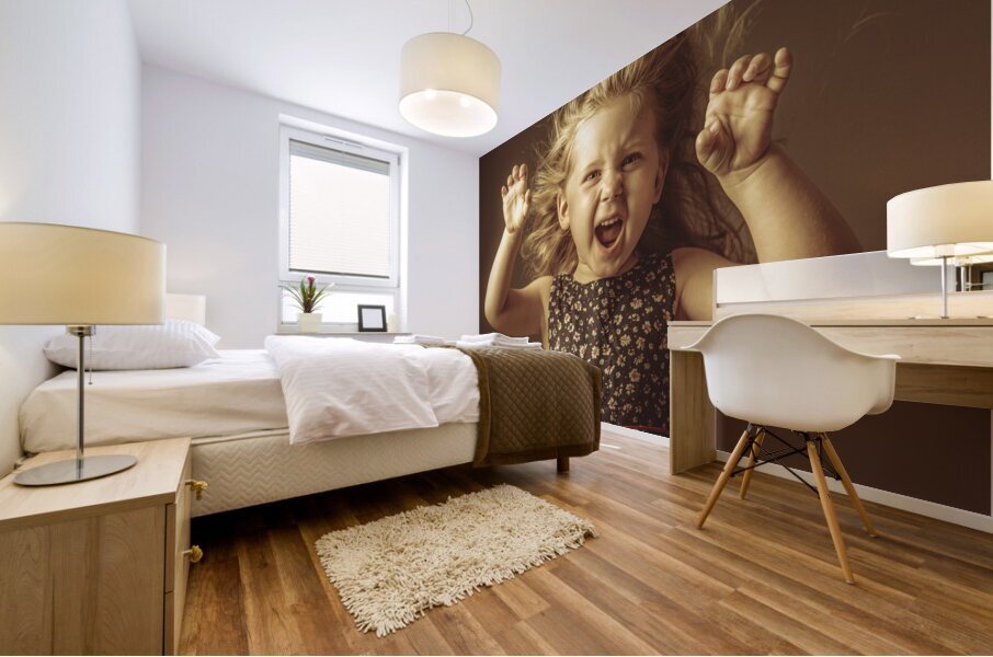  little girl with funny expression Mural print