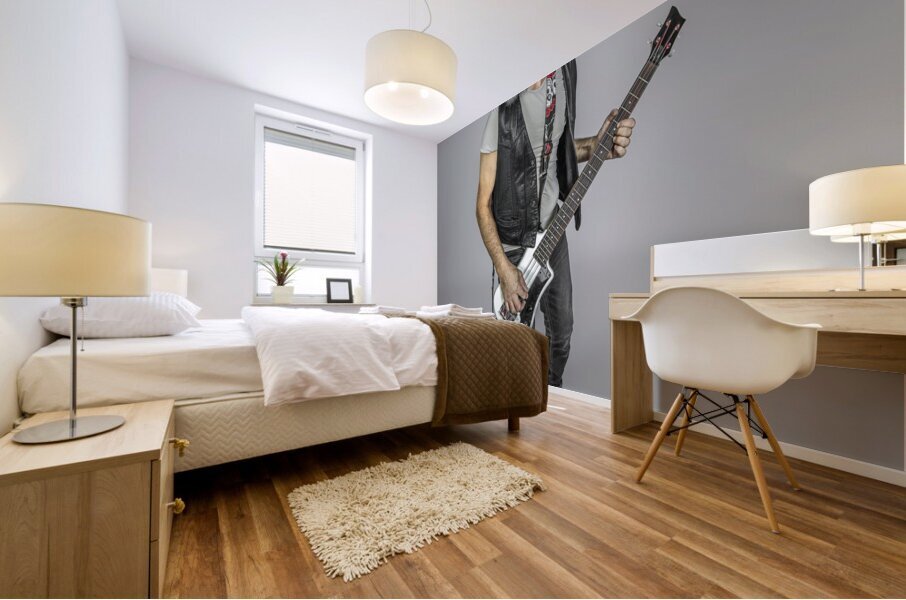 man with long fluttering hair plays bass guitar Mural print