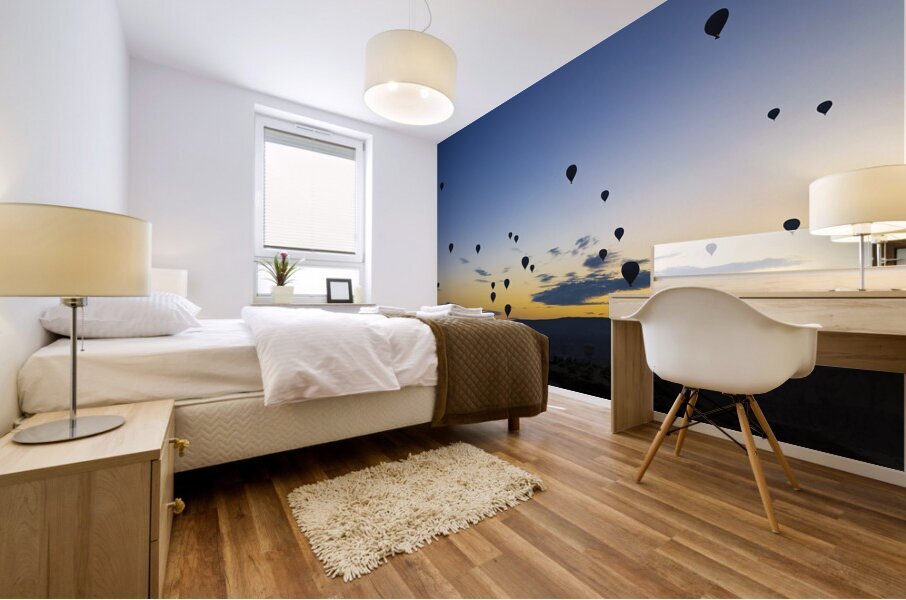 hot air balloons take off at sunrise over the city of goreme  Mural print