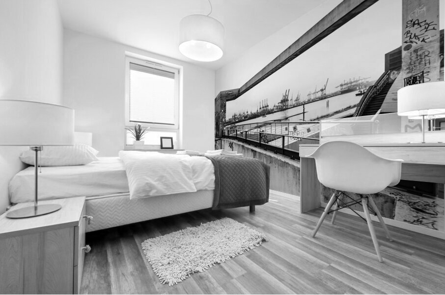 Black and white shot of the Elbe River in Hamburg seen through concrete arch Mural print