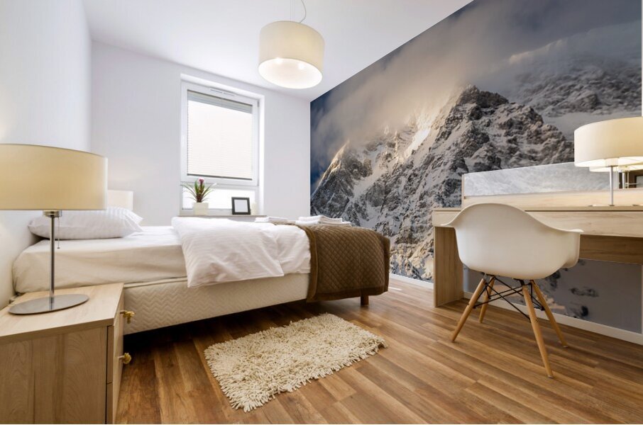 Sun rays shining through the clouds on a gorgeous morning at the Ortler Mountain in South Tyrol  Mural print