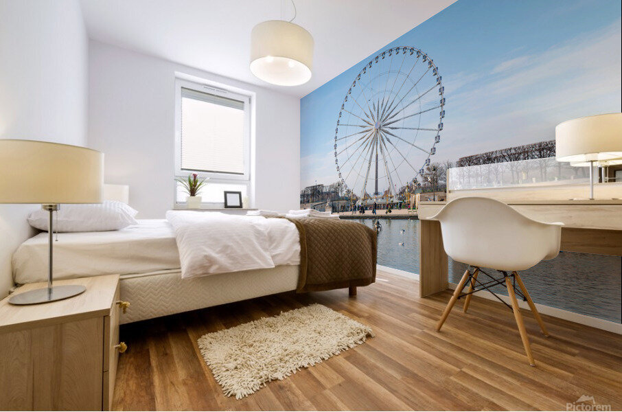 Paris ferris-wheel against blue sky from the Tuileries park Mural print