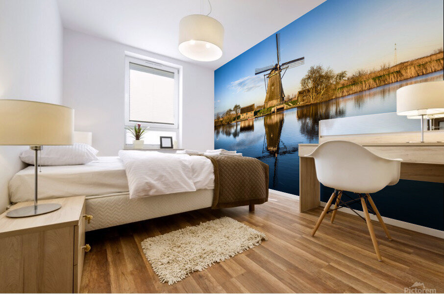 Windmill reflecting in water at sunset Mural print