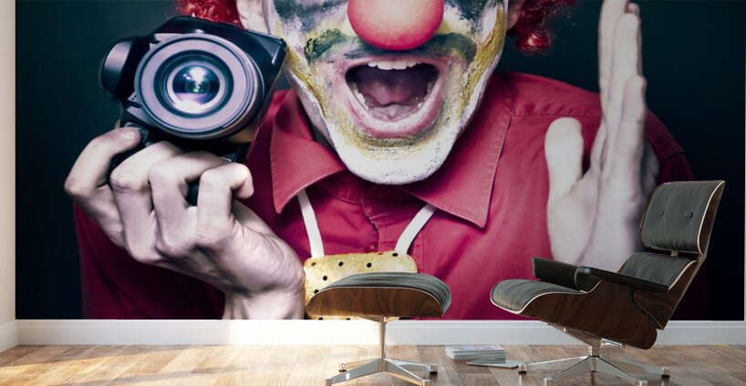 Excited Clown With Camera At Kids Birthday Party Wall Murals