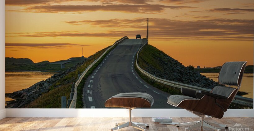 A car on the Fredvang bridges in Lofoten Norway with a beautiful sunset over the sea.  Wall Murals