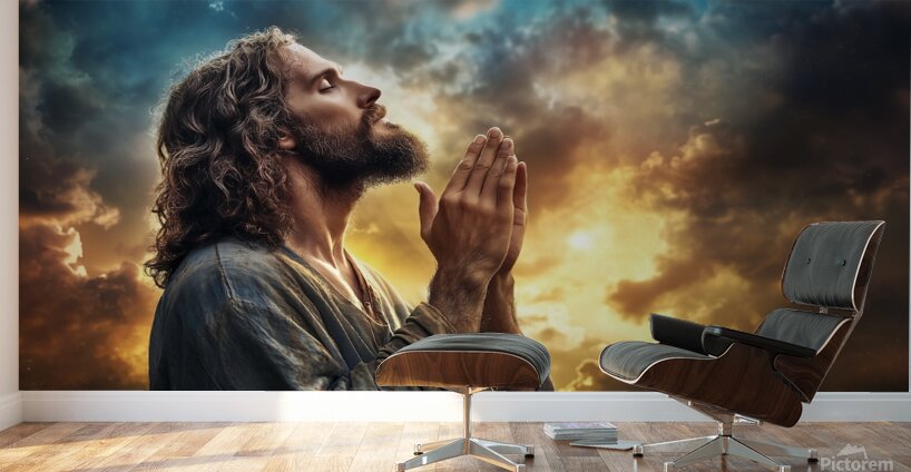 Spiritual reflection at sunset with Jesus Christ in prayer amidst dramatic clouds Wall Murals