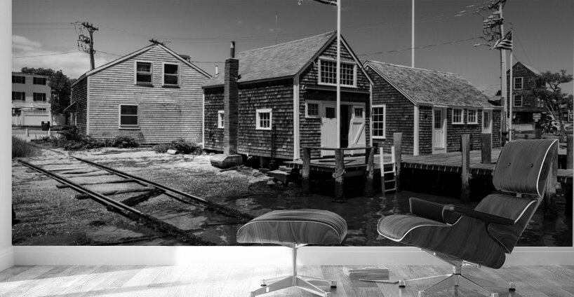 Black and white shot of historic harbour buildings and boat ramp on Cape Cod in New England  Wall Murals