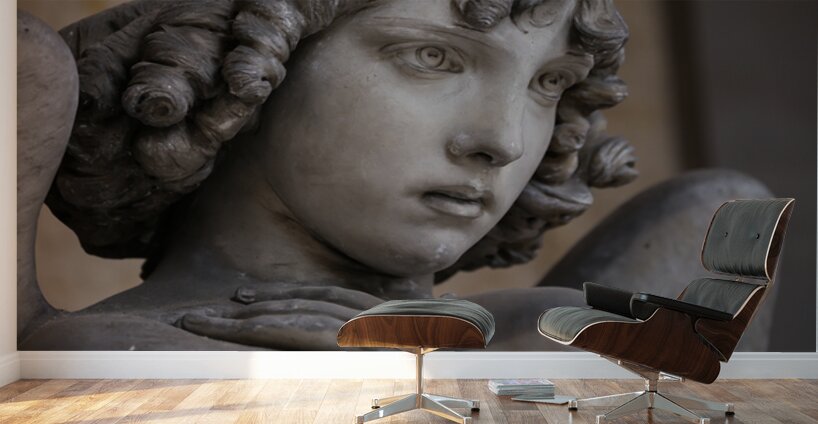 Guardian angel statue in antique cemetery. Wall Murals