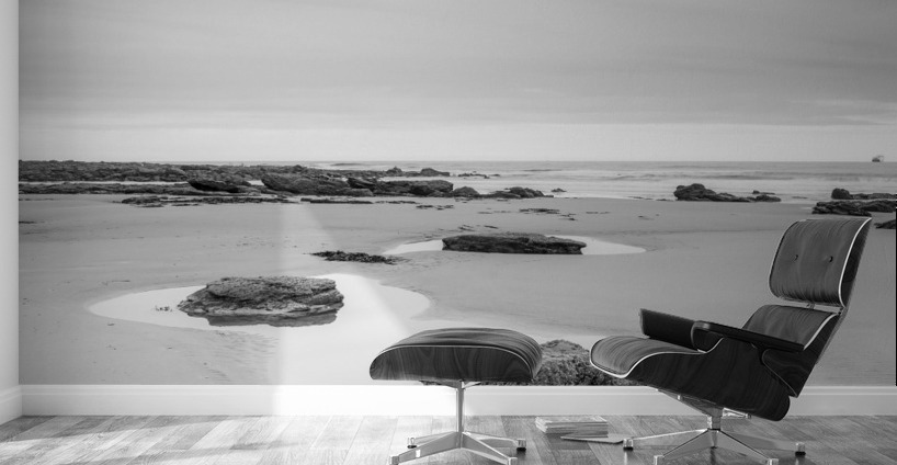 Rock pools on a sandy beach Wall Murals