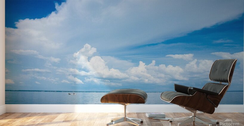 Seascape with bright blue cloudy sky. Wall Murals
