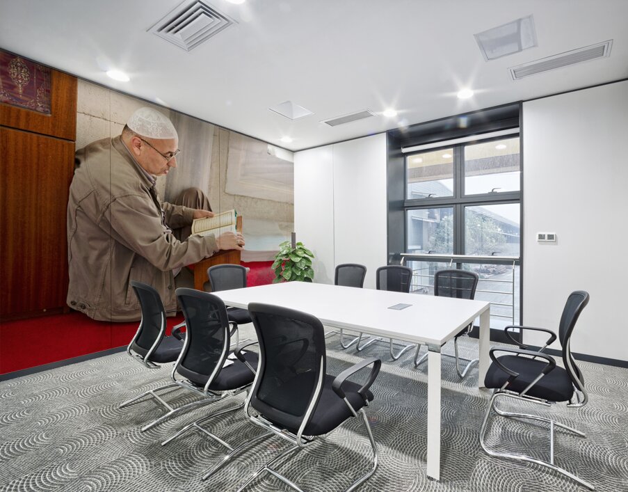 Istanbul Turkey. Muslim believer praying and reading Koran in the Fatih Mosque Wall Printing