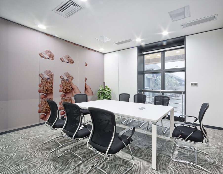 Hand Holding Seed Snack with Repetitive Pattern Wall Printing