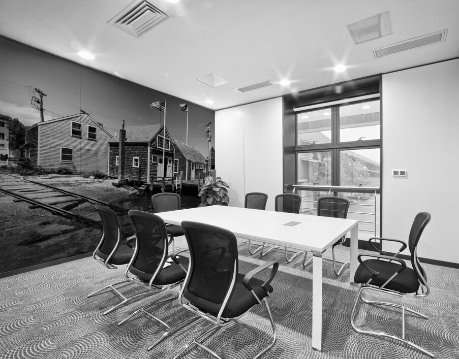 Black and white shot of historic harbour buildings and boat ramp on Cape Cod in New England  Wall Printing