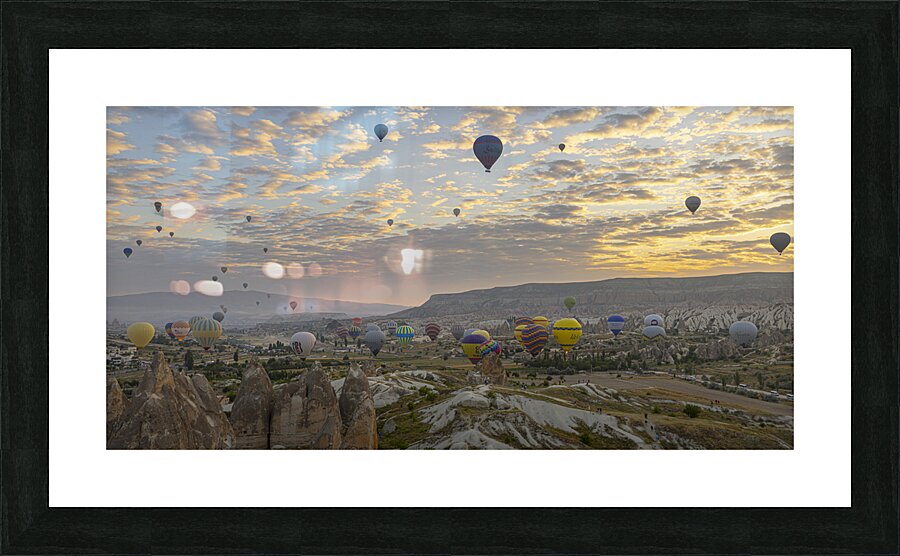 hot air balloon flies in the sky at dawn Picture Frame print