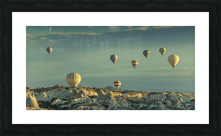 hot air balloons fly over goreme at dawn. Picture Frame print