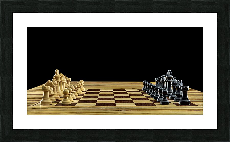 Wooden chess pieces standing on chessboard Picture Frame print