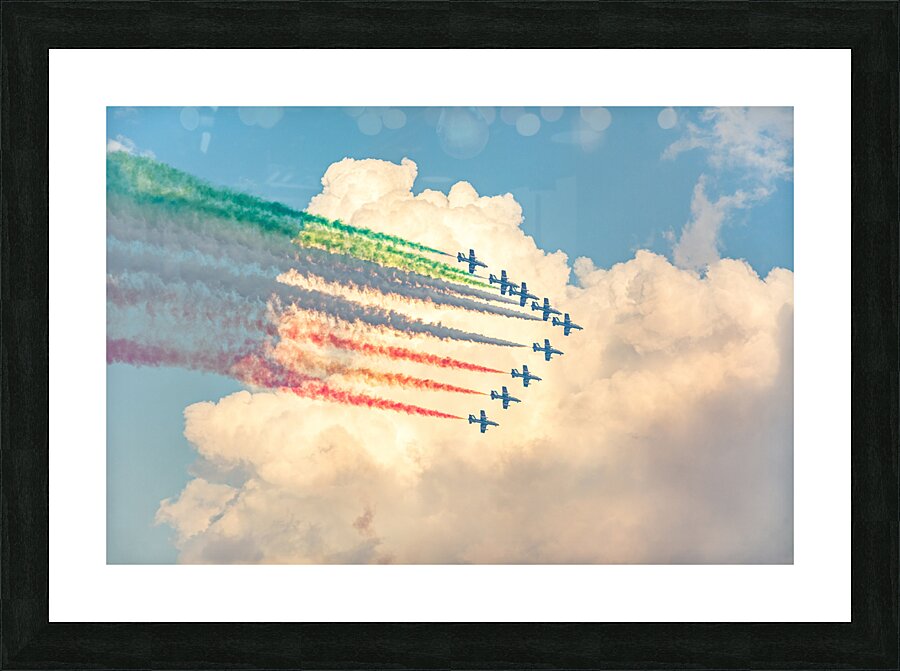Fighter jets performing airshow with colorful exhaust streams in scenic clouds Picture Frame print