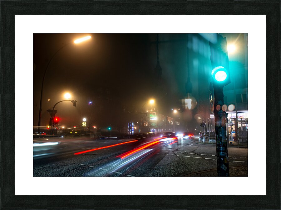 Long exposure night shot of a lit up streetcorner in Hamburg Altona Picture Frame print
