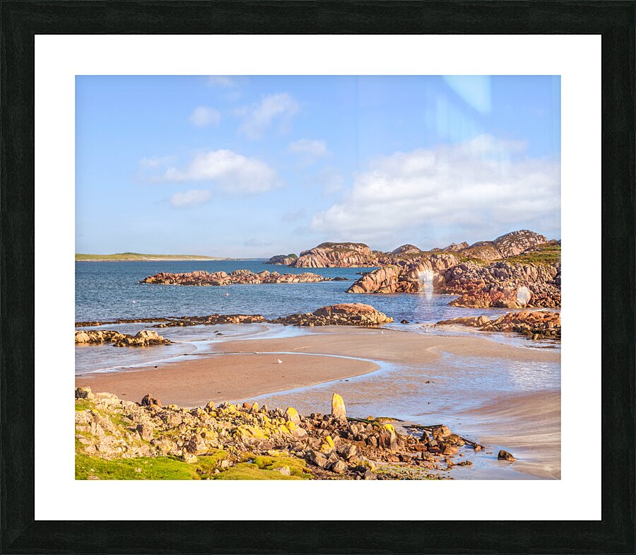 The beach at Fionnphort Mull Scotland with Iona in the background. Fionnphort is the ferry terminal for Iona. Picture Frame print
