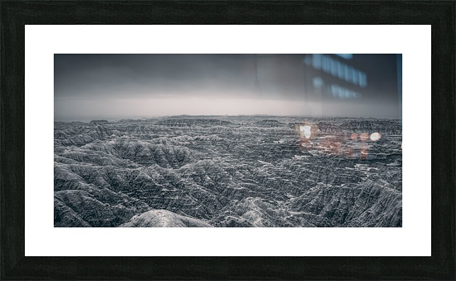 Shadows of the Earth: Ghostly Vista of the Badlands Picture Frame print