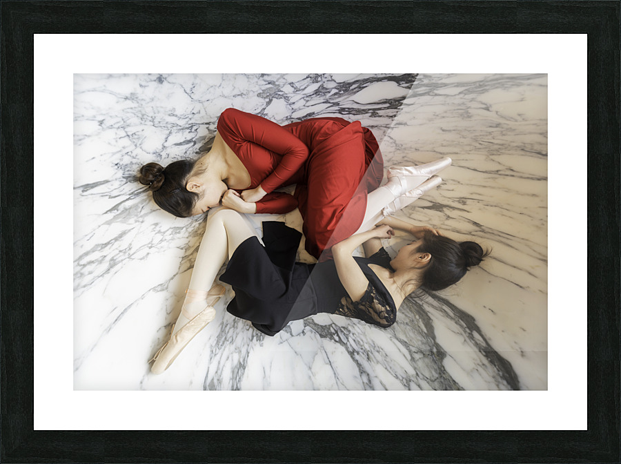 Two ballerinas lying down in a bathtub Picture Frame print