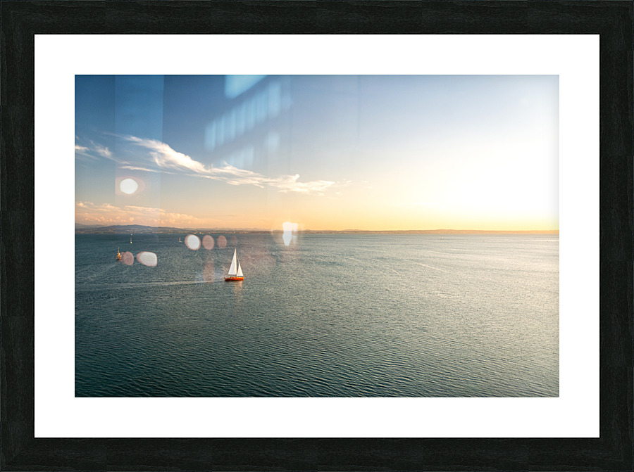 Lonely sailing boat on Lake Constance Picture Frame print