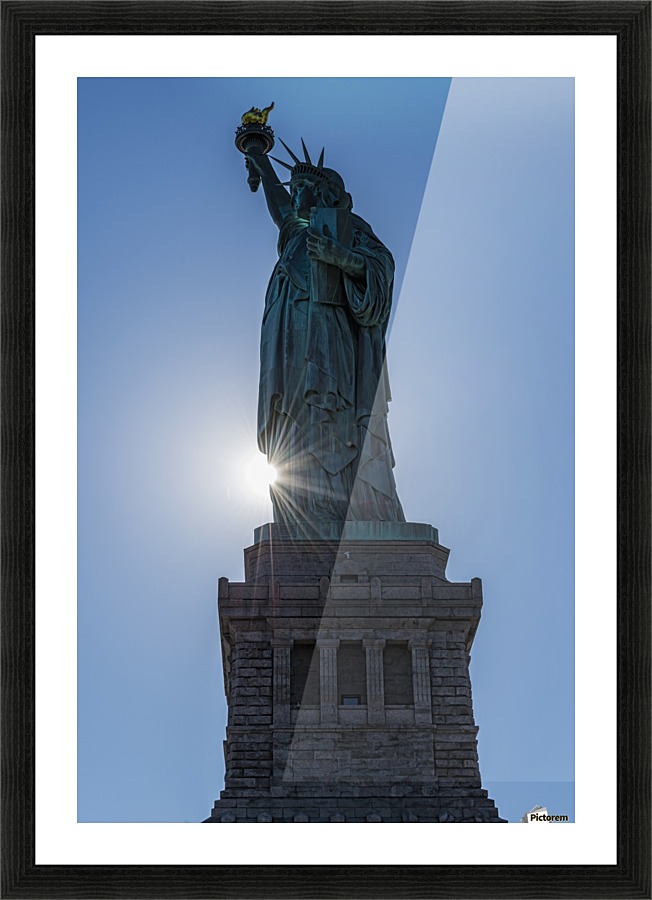 Sun Setting Behind The Statue Of Liberty Island New York Sun Setting Behind The Statue Of Liberty Island New York City