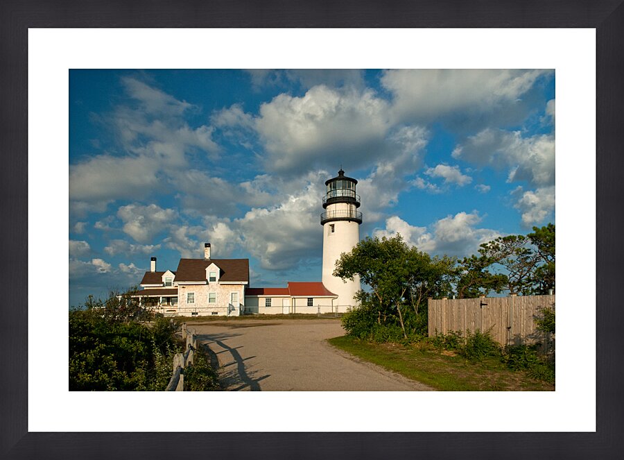 Cumulus Clouds Over Highland Lighthouse on Cape Cod in Massachusetts Picture Frame print