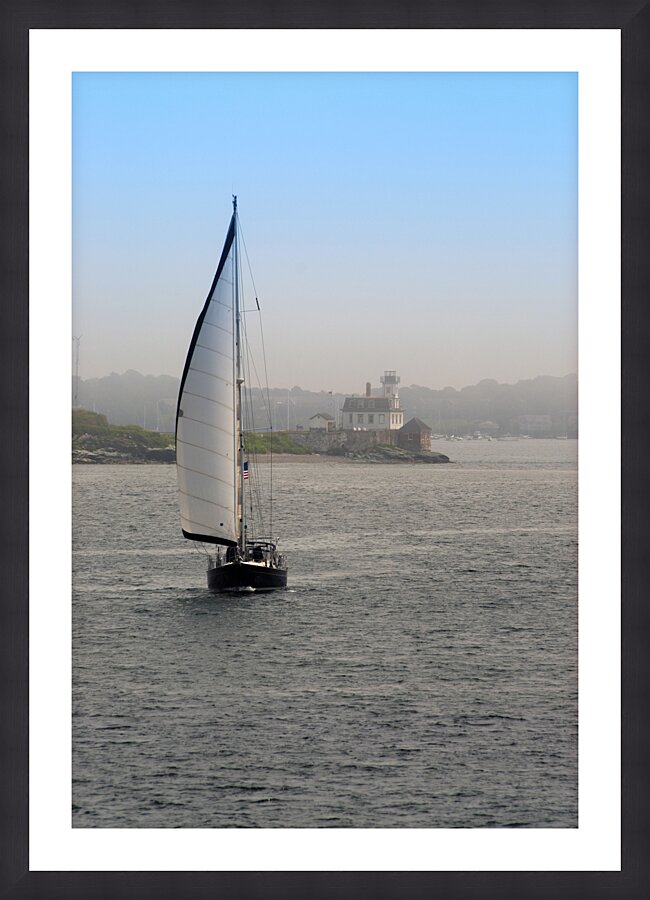 Sailboat Passes Rose Island Lighthouse as Fog Begins to Lift in Rhode Island Picture Frame print