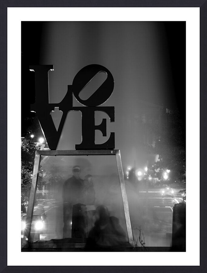 couples pose under love sculpture  vertical 2237 Picture Frame print