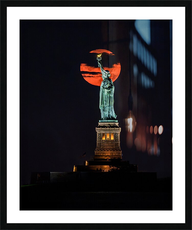 Sturgeon Moon Rising behind Lady Liberty Picture Frame print